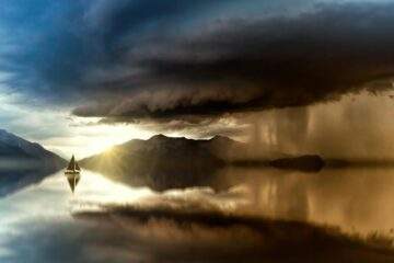 boat out at sea at dusk